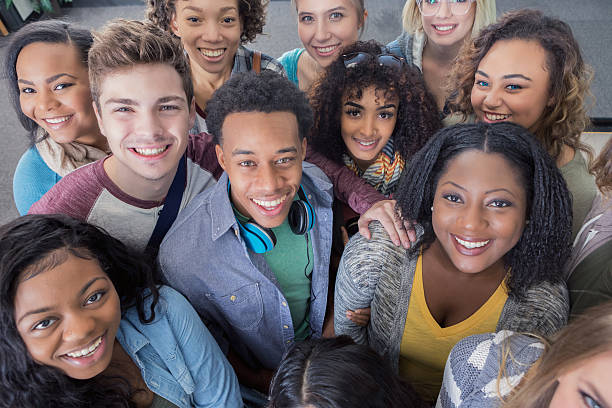 Happy black students studying